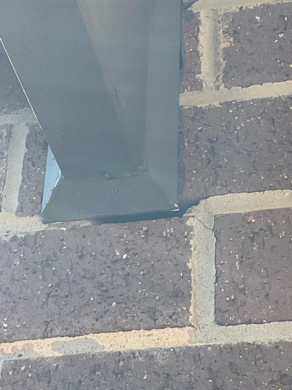 Open joint in the external wall, left without sealant at handover, found during a pre-handover inspection in Aintree