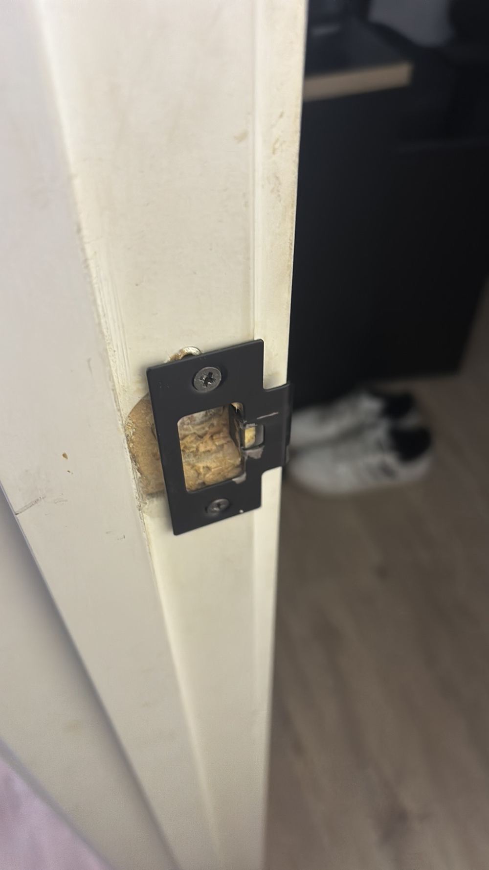 Loose door hardware that stops the door closing and locking reliably, found during a pre-purchase inspection in Braybrook